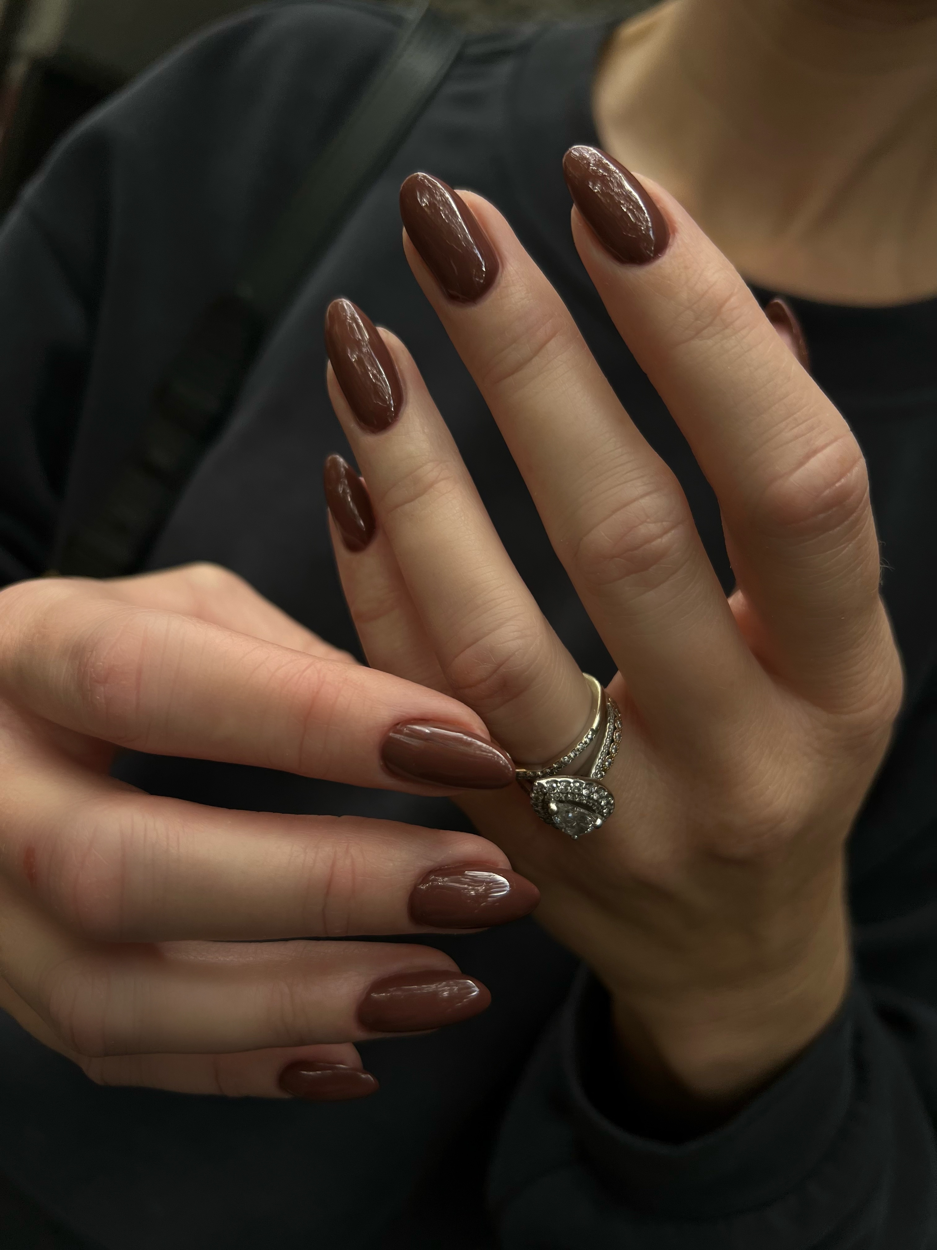 Elegant chocolate brown almond shape gel nails with glossy finish in Sunnyvale